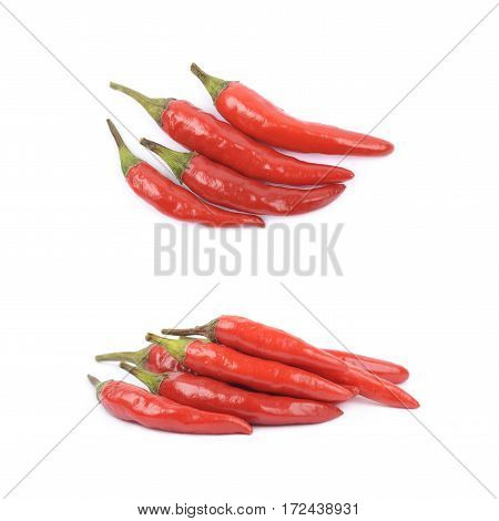 Pile of red italian peppers isolated over the white background, set of two different foreshortenings