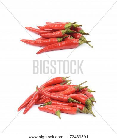 Pile of red italian peppers isolated over the white background, set of two different foreshortenings