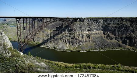 Traffic Big Trucks Transportation Driving Over Bridge Spanning Canyon and River
