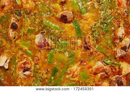Paella from Spain recipe process boiling broth step by step