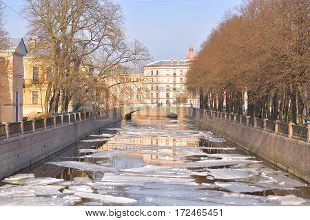 View of the Griboyedov Canal. Flow of the Neva delta in St. Petersburg at sunny spring day Russia.