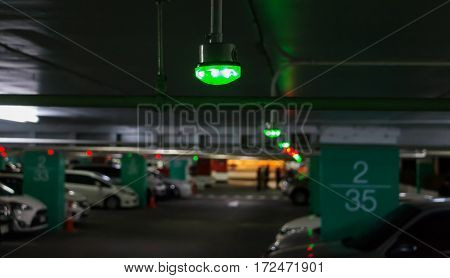 green light over vacant lot for parking