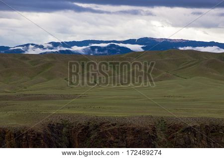 Scene of steppe and mountaints on a background Kazakhstan.