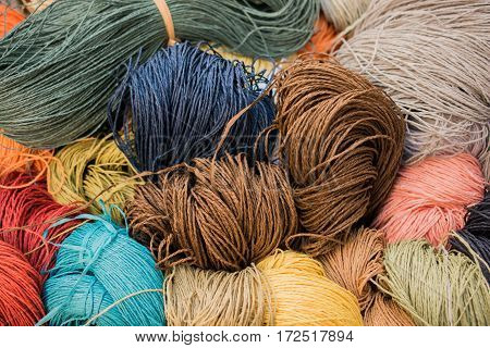 Set or rolls of colotful string on a background