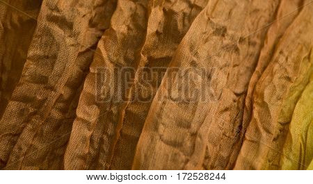 highly orange wrinkled crinkled silk cloth texture
