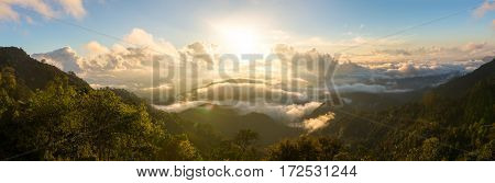 Sunrise at Doi Ang Khang in Chiang Mai, Thailand. Clouds over the mountains. Panorama shot