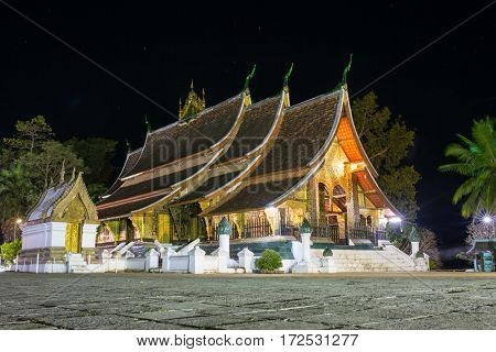 Wat Xieng Thong temple at night in Luang Prabang, Laos