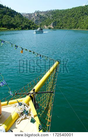 Tourists On A Boat At The River Who Takes To The Krka National Park