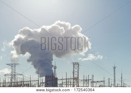 Cooling towers of NPP or Nuclear Power Plant with thick smoke