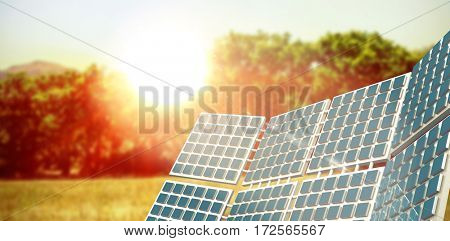 Three dimensional of solar power against sun rise over trees