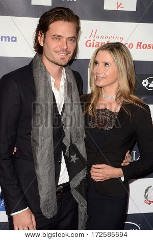 LOS ANGELES - FEB 19:  Christopher Backus, Mira Sorvino at the Los Angeles Italia Film Festival at the TCL Chinese 6 Theaters on February 19, 2017 in Los Angeles, CA
