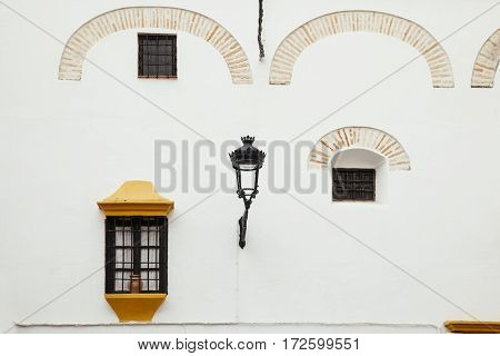 Typical spanish house with ancient windows and idilic andalusian atmosphere.
