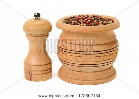 Different kinds of pepper and peppermill isolated on white background.