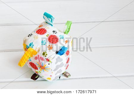 handmade toy dice pillow on white background with copy space