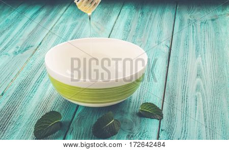 Dish With Honey And Spoon For Honey