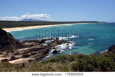 Beach at Cuttagee Point in summertime NSW Australia.
