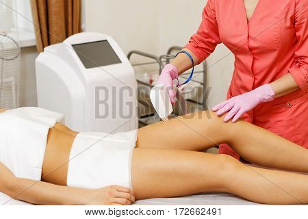 Laser hair removal hip girl. Hardware cosmetology. Cosmetic procedures. Spa.