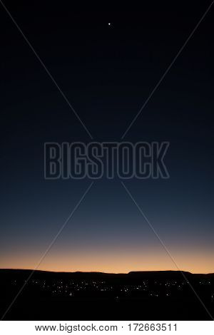 Sunset over the hills in San Luis Potosi with Sirius star at the top