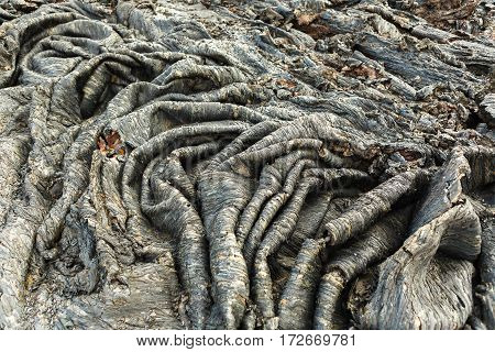 Background of the waves frozen lava field at the Tolbachik volcano, after eruption in 2012, Klyuchevskaya Group of Volcanoes