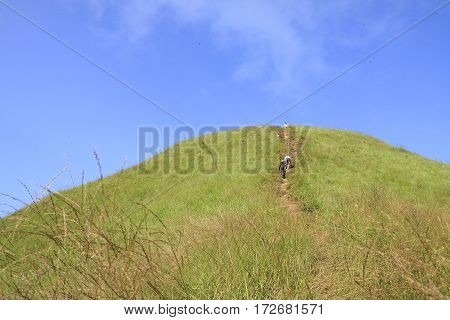 Tourists are climbing to the viewpointThong Pha Phum National Park