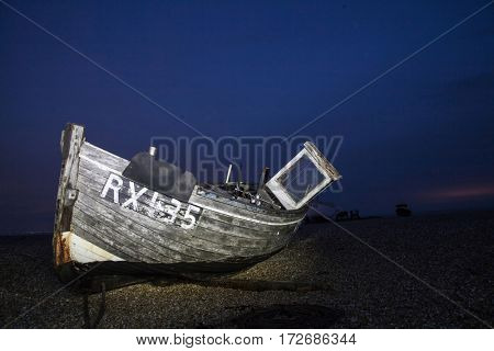 Shipwreck in the dusk on England`s coastline