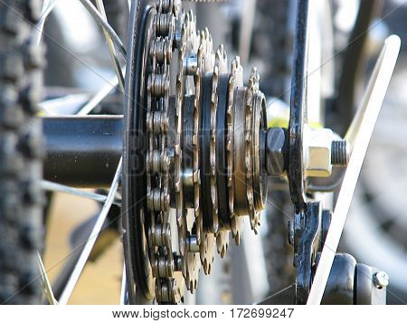 The asterisk and a bicycle chain close-up, switching mechanism
