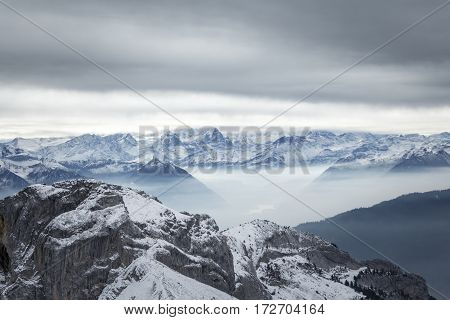 A stormy, wintery mountainscape. Could be used to show winter adventure or danger