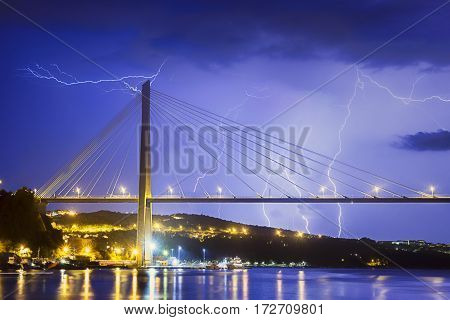 A shot of lightning striking the Franjo Tudjman Bridge in Dubrovnik, Croatia