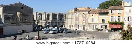 People Walking In Front Of The Amphithater At Arles