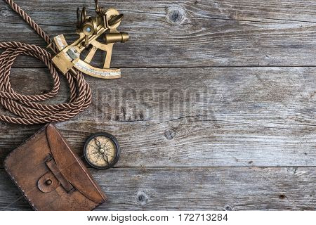 vintage still life with compass,sextant and spyglass