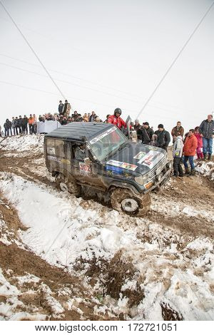 ALMATY, KAZAKHSTAN - FEBRUARY 21 2013: Off-road racing on jeeps Car competition ATV. Traditional race 