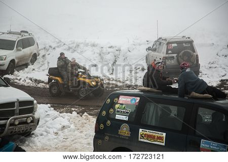 ALMATY KAZAKHSTAN - FEBRUARY 21 2013: Off-road racing on jeeps Car competition ATV. Traditional race 