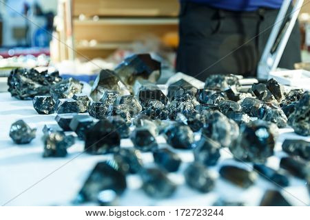 rare gems and minerals on a shelf in a souvenir shop and magic