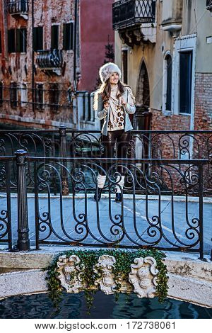 Traveller Woman In Venice, Italy Looking Into The Distance