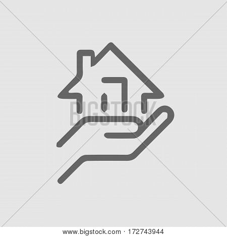 Hand holding house vector icon. Real estate symbol. Vector illustration EPS 10.