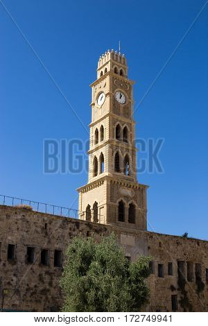 Khan al-Umdan Clock Tower in Old City Acre Israel. Ottoman landmark building