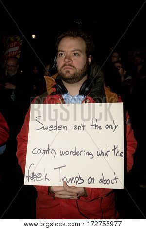 London United Kingdon - Febuary 20th 2017: Protesters gather in Parliment Square to protest the invitation to United States President Donald Trump on a state visit to Great Britain as Parliment debate the visit