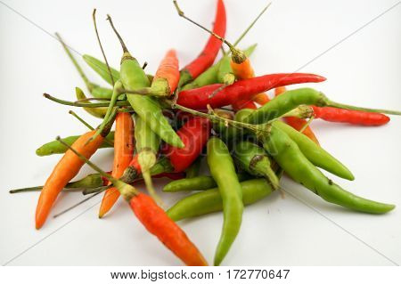 Chili take with white background.It have rawmiddleripe chili so beauty color.