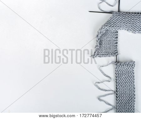 Knitted sweaters with knitting needles and wool hendmade