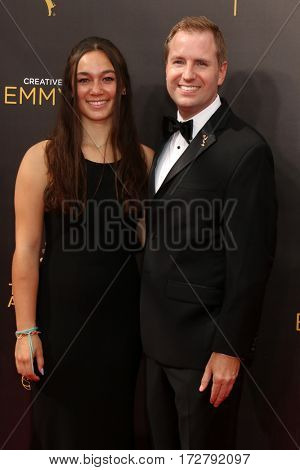 LOS ANGELES - SEP 10:  Guest, Maury McIntyre at the 2016 Creative Arts Emmy Awards - Day 1 - Arrivals at the Microsoft Theater on September 10, 2016 in Los Angeles, CA