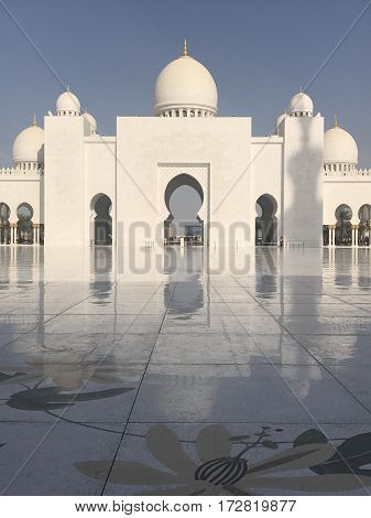ABU DHABI, UAE-FEB 11, 2017: Sheikh Zayed Grand Mosque in Abu Dhabi, United Arab Emirates. It is the key place of worship in the UAE and may be visited by more than 40,000 people during Eid.
