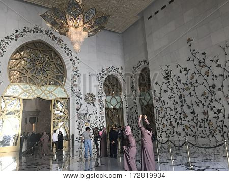 ABU DHABI, UAE-FEB 11, 2017: Sheikh Zayed Grand Mosque in Abu Dhabi, United Arab Emirates. It is the key place of worship in the UAE and may be visited by more than 40,000 people during Eid.