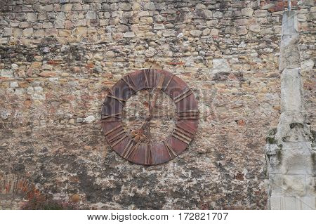 Old clock on the wall on Kaptol defensive wall, Zagreb, Croatia