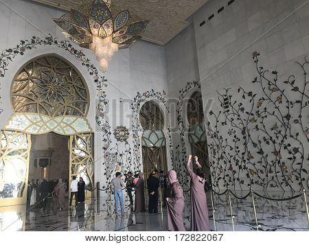 ABU DHABI, UAE-FEB 11, 2017: Sheikh Zayed Grand Mosque in Abu Dhabi, United Arab Emirates. It is the key place of worship in the UAE and may be visited by more than 40,000 people during Eid.