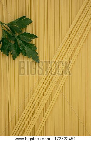 Thin Pasta Arranged In Rows. Yellow Italian Pasta. Long Spaghetti.. Thin Spaghetti. Food Background