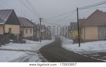 Fog Morning In Spisske Tomasovce Winter Village