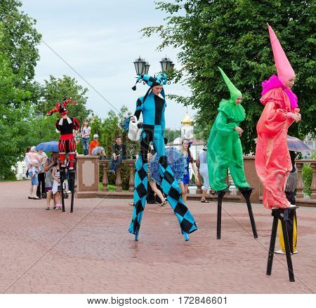 VITEBSK BELARUS - JULY 13 2016: Buffoons on stilts during festival Slavic Bazaar Vitebsk Belarus