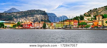 Alpine scenery - beautiful lake Lago di Garda and village Torbole, Italy