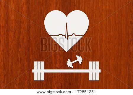 Barbell dumbbells and heart with echocardiogram. Healthy lifestyle concept. Abstract conceptual image