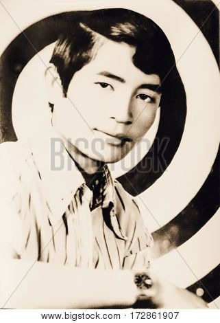 Picture from camera film of a man. vintage styles sepia color tone.